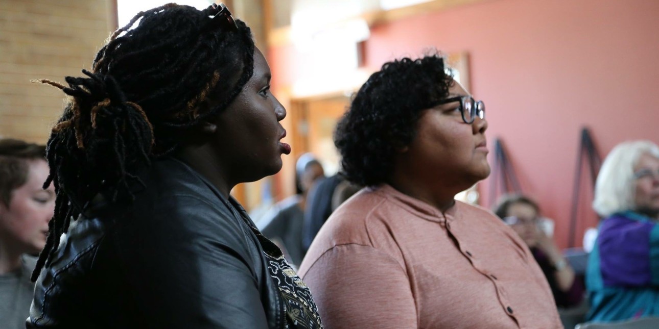 Kris Henderson and Nikki rant look off toward the stage