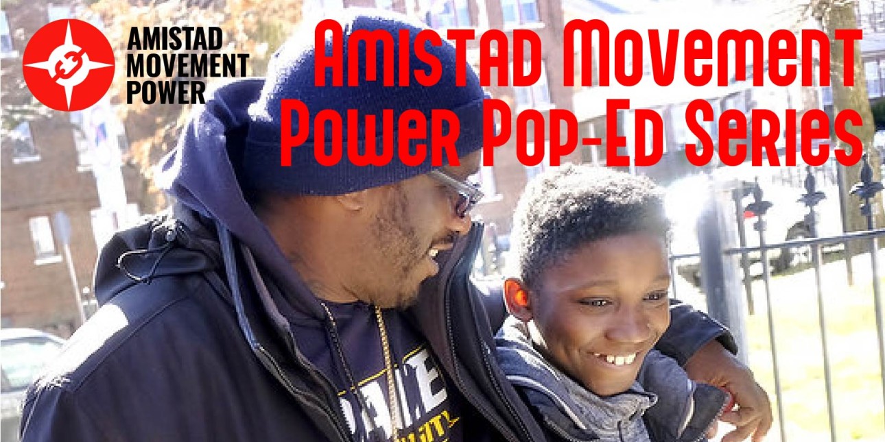 a man walks with arm around a boy and heading reads Amistad Movement Power Pop-Ed Series