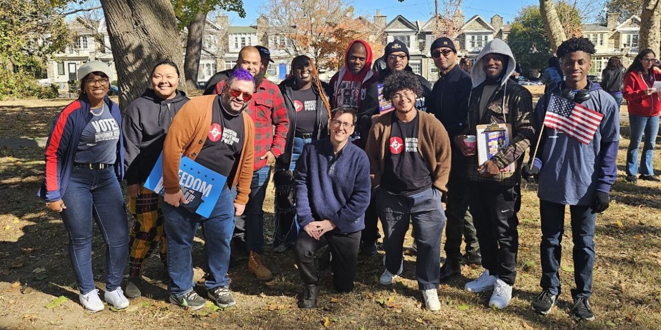 A group of canvassers huddle together