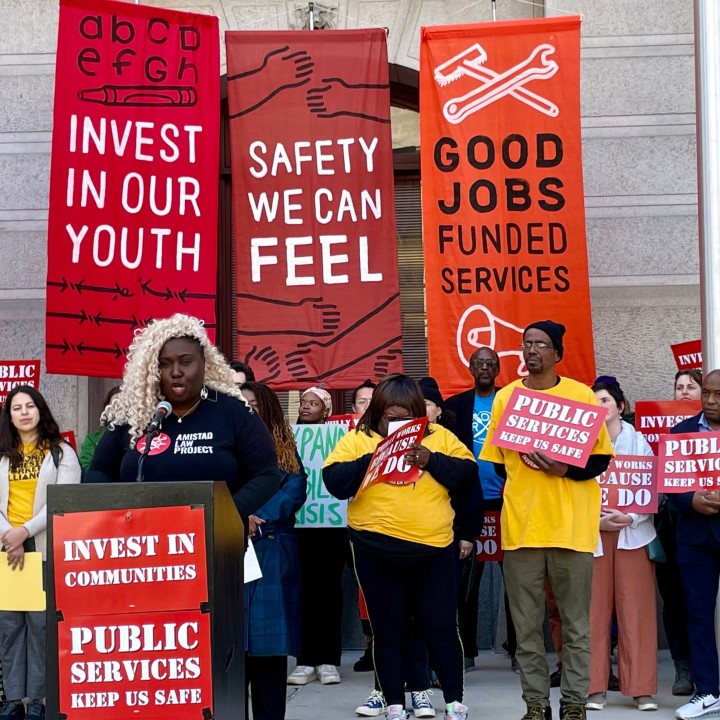 Nikki grant speaks at a people's budget rally